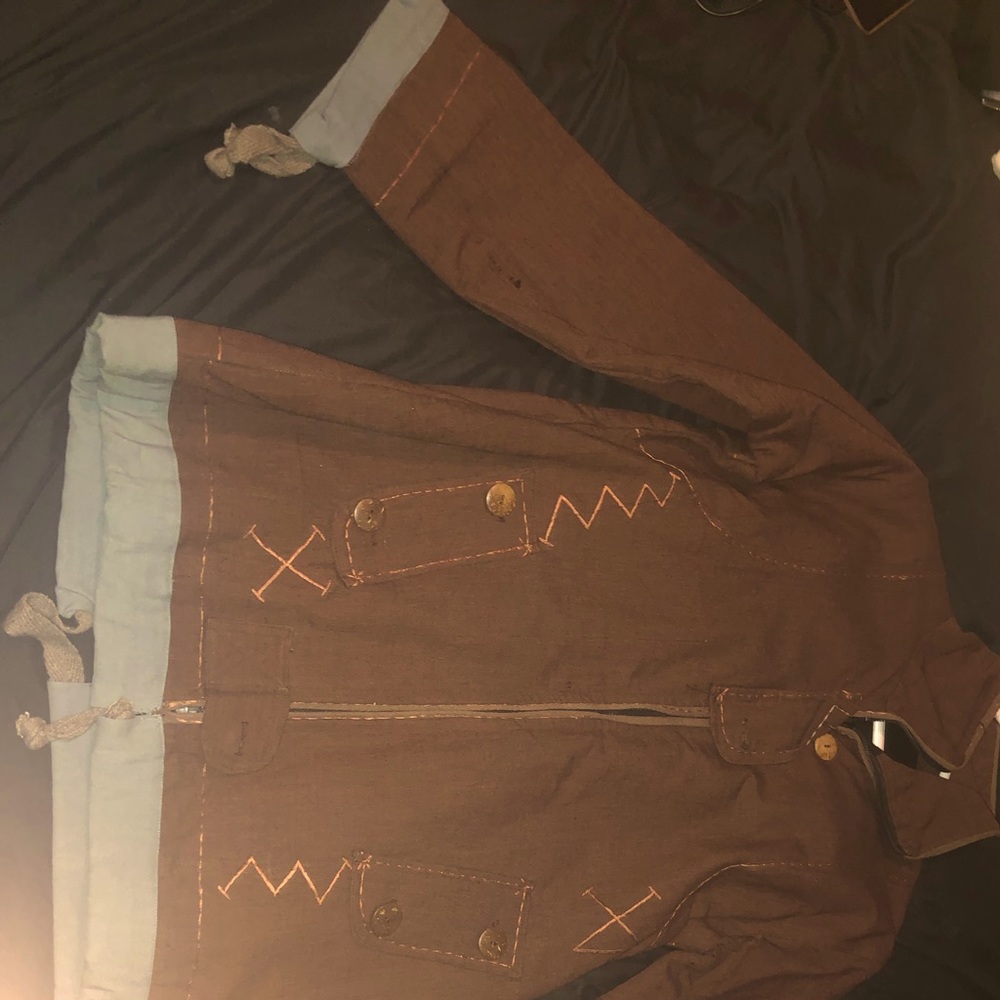 A woman’s fall jacket from EXO size medium colour brown.